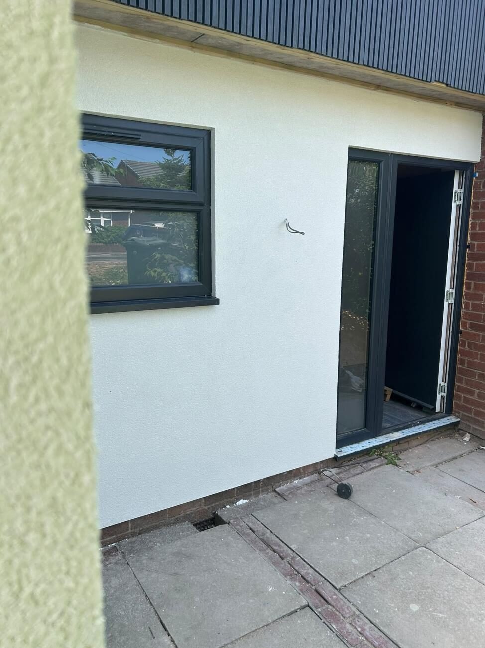 Freshly plastered interior wall and doorway ready to decorate